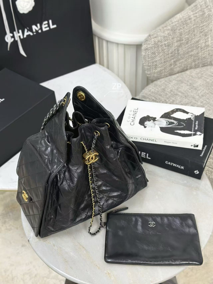 One C-brand handbag, one C-brand item, and one pair of C-brand glasses